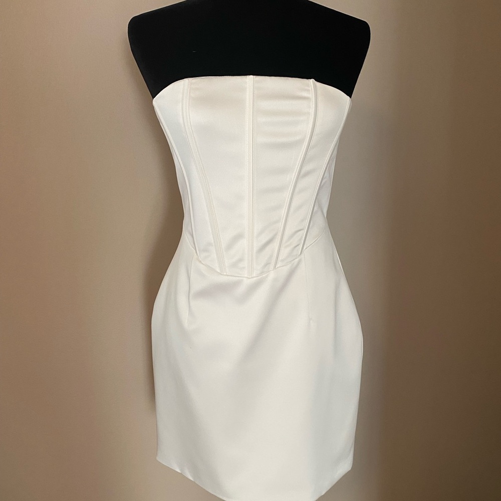 Meshki White satin strapless bodycon corset dress.